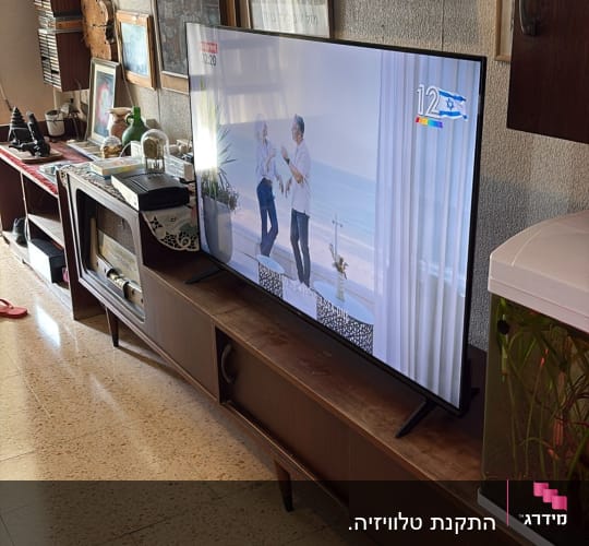 התקנת טלוויזיה.